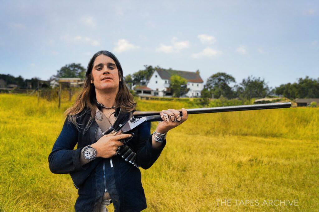 Ozzy holding a shotgun